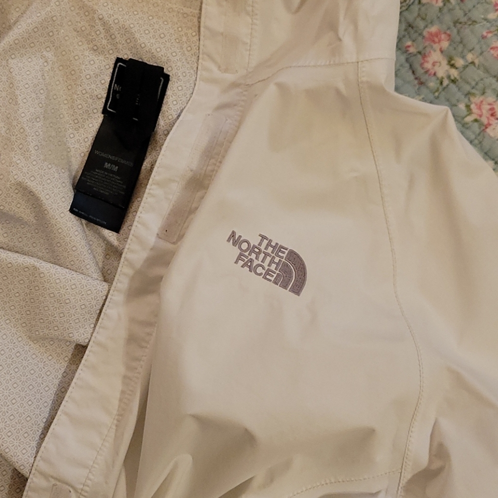 White North Face rain jacket